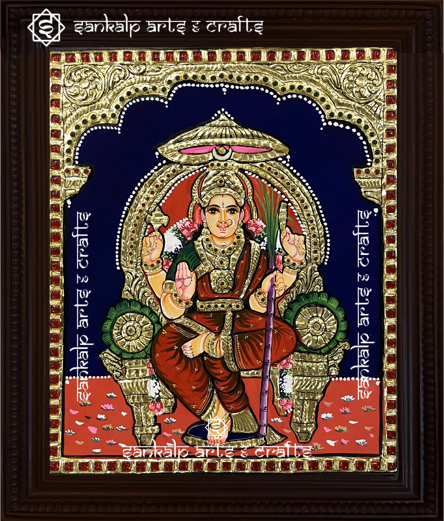 A beautifully handcrafted Lalithambigai Tanjore painting in Chennai & Bangalore, depicting Goddess Lalithambigai in her radiant form, adorned with intricate gold foil detailing, vibrant colors, and traditional embellishments, symbolizing divine grace and power.

