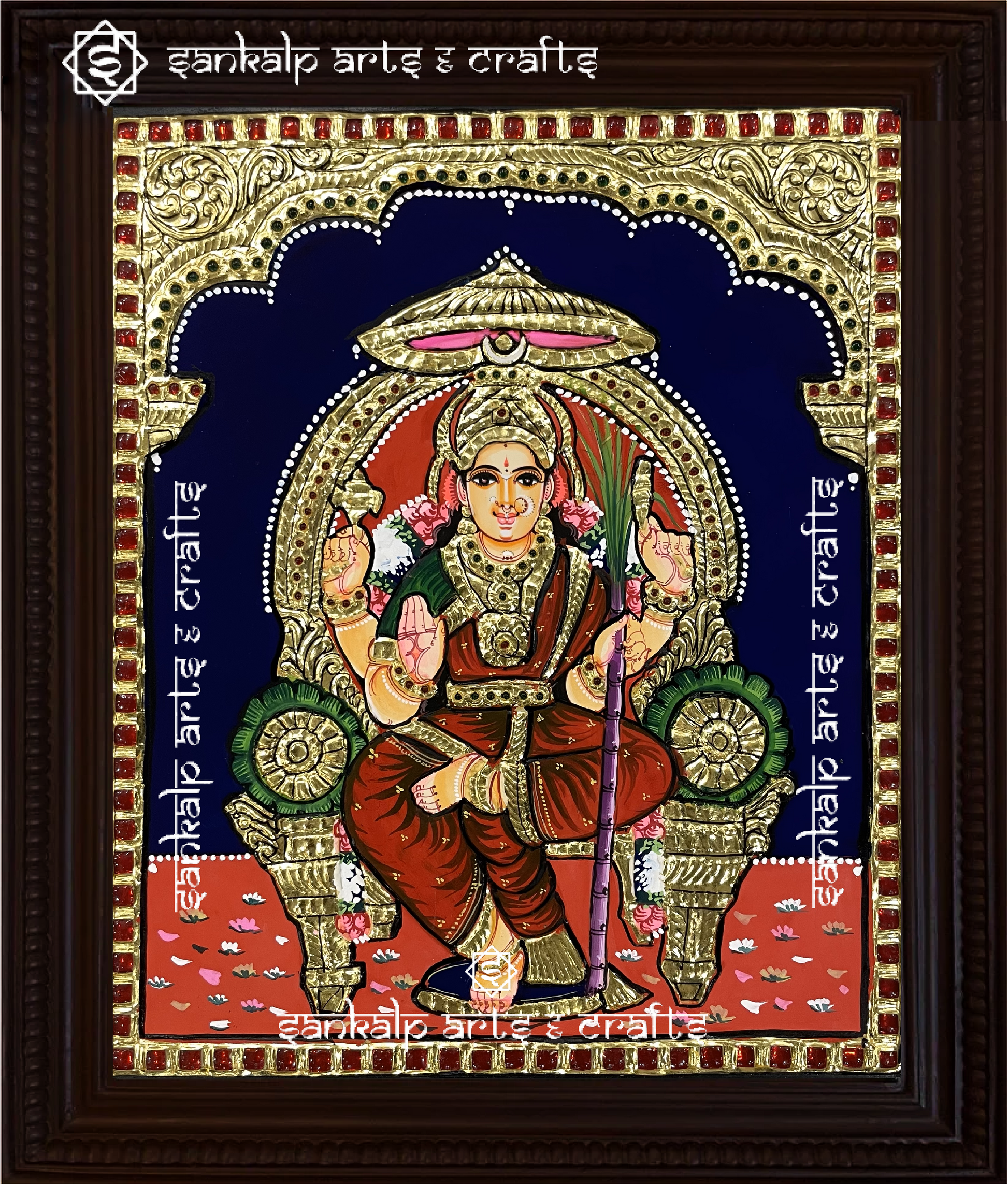 A close-up of the Lalithambigai Tanjore painting in Chennai & Bangalore, showcasing the goddess in a majestic pose with exquisite gold foil work, rich hues, and intricate detailing, perfect for invoking divine blessings and elegance in any sacred space.

