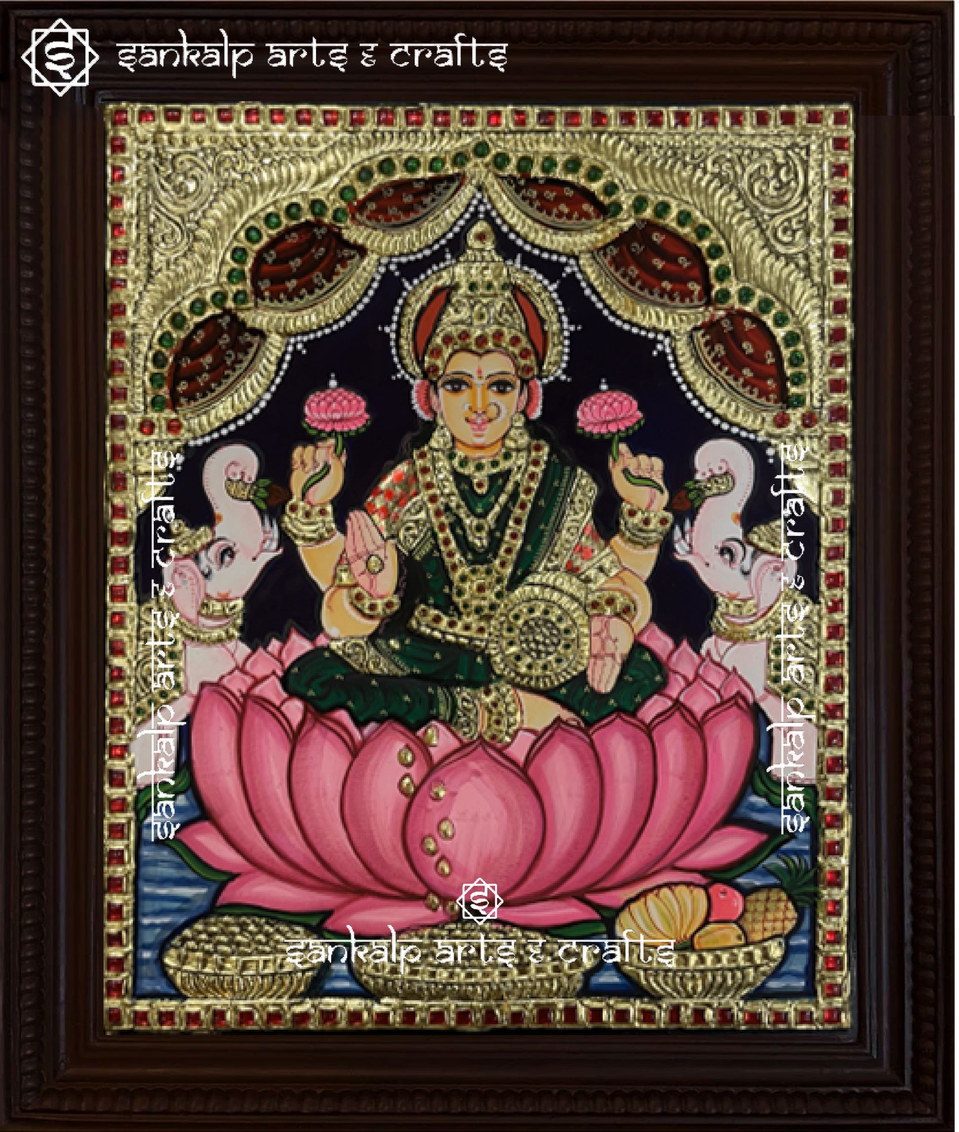 A close-up of the Mahalakshmi Tanjore painting showcasing exquisite gold embellishments, rich hues, and detailed craftsmanship. Goddess Lakshmi is seen with her sacred attributes, radiating grace, abundance, and prosperity.

