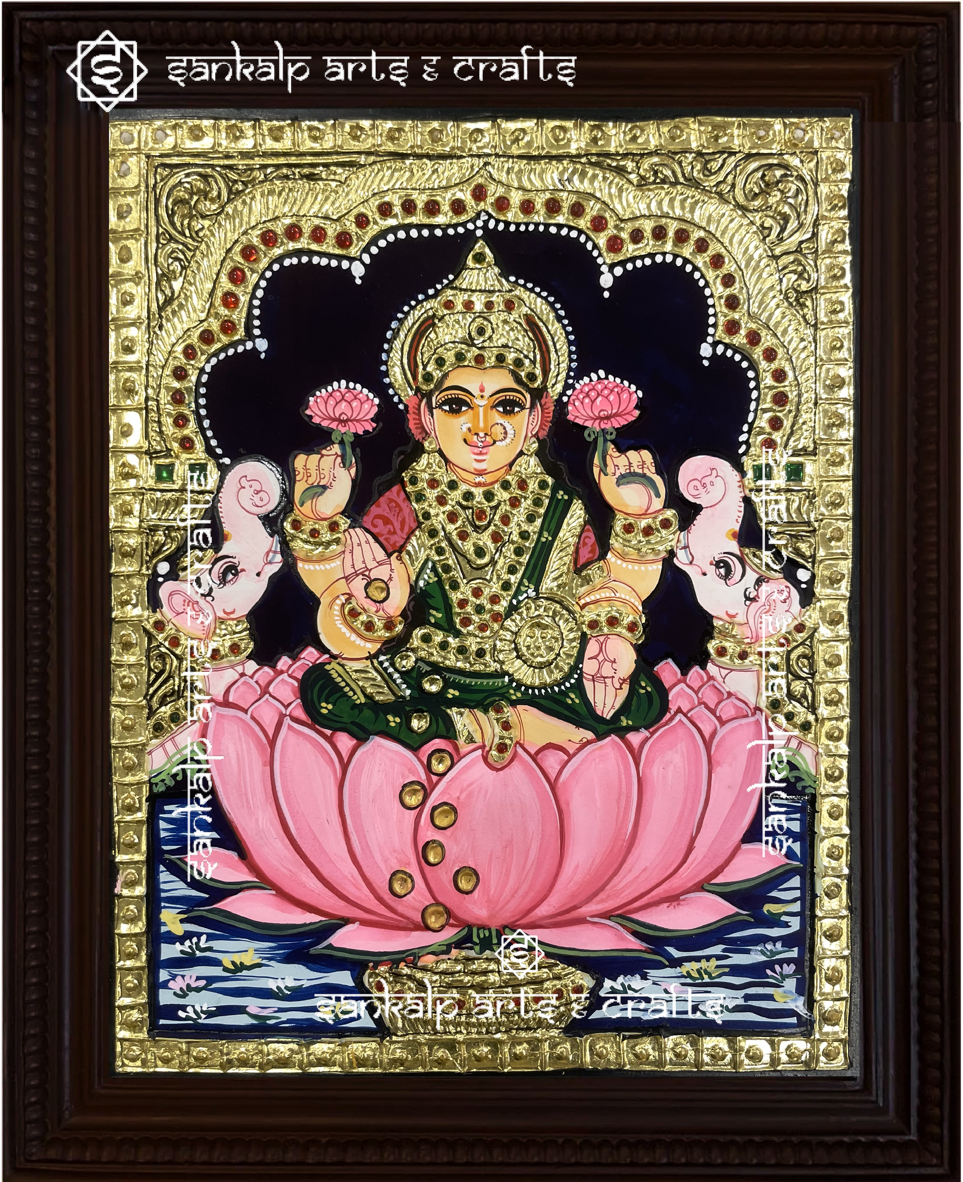 This Mahalakshmi Tanjore painting radiates prosperity and grace with rich colors and fine craftsmanship. A perfect pooja room addition in Chennai & Bangalore.

