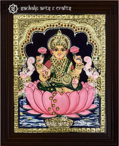 This Mahalakshmi Tanjore painting radiates prosperity and grace with rich colors and fine craftsmanship. A perfect pooja room addition in Chennai & Bangalore.

