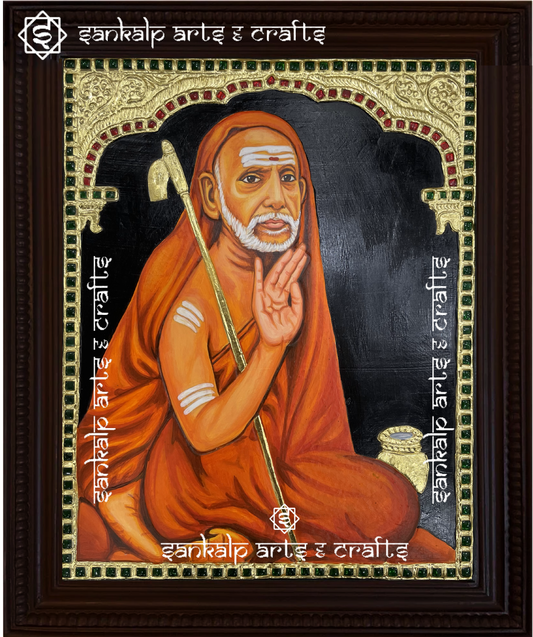 A handcrafted Mahaperiyava Tanjore painting featuring the revered Kanchi Paramacharya in serene meditation, highlighted by intricate gold foil detailing and vibrant colors. This artwork embodies wisdom, spirituality, and divine blessings.

