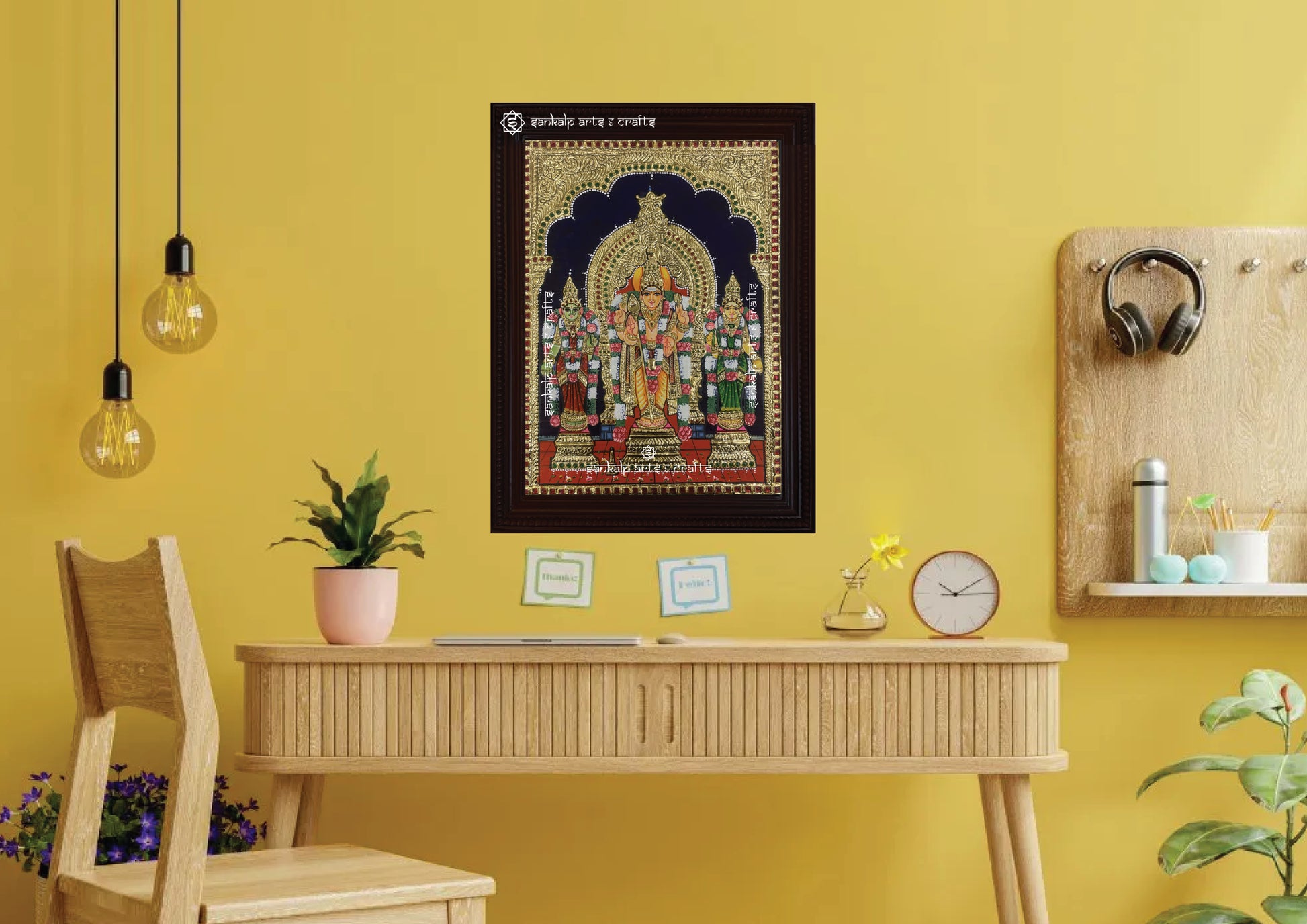 A beautifully detailed Tanjore painting of Lord Murugan with his consorts, enhancing the spiritual ambiance of home decor. Available in Chennai & Bangalore.

