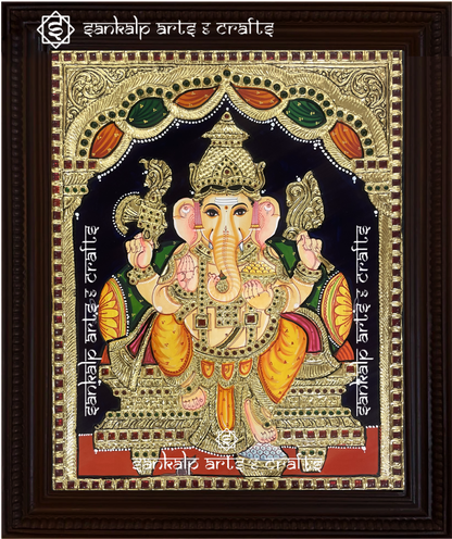 A divine Ganesha Tanjore painting in North Indian style, featuring intricate gold detailing and vibrant colors. Available in Chennai & Bangalore.

