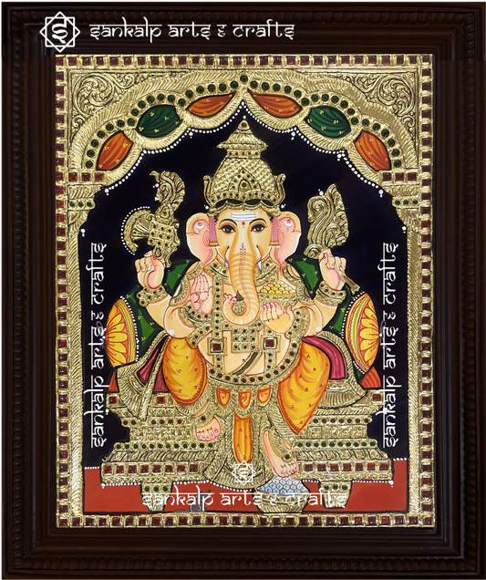A divine Ganesha Tanjore painting in North Indian style, featuring intricate gold detailing and vibrant colors. Available in Chennai & Bangalore.

