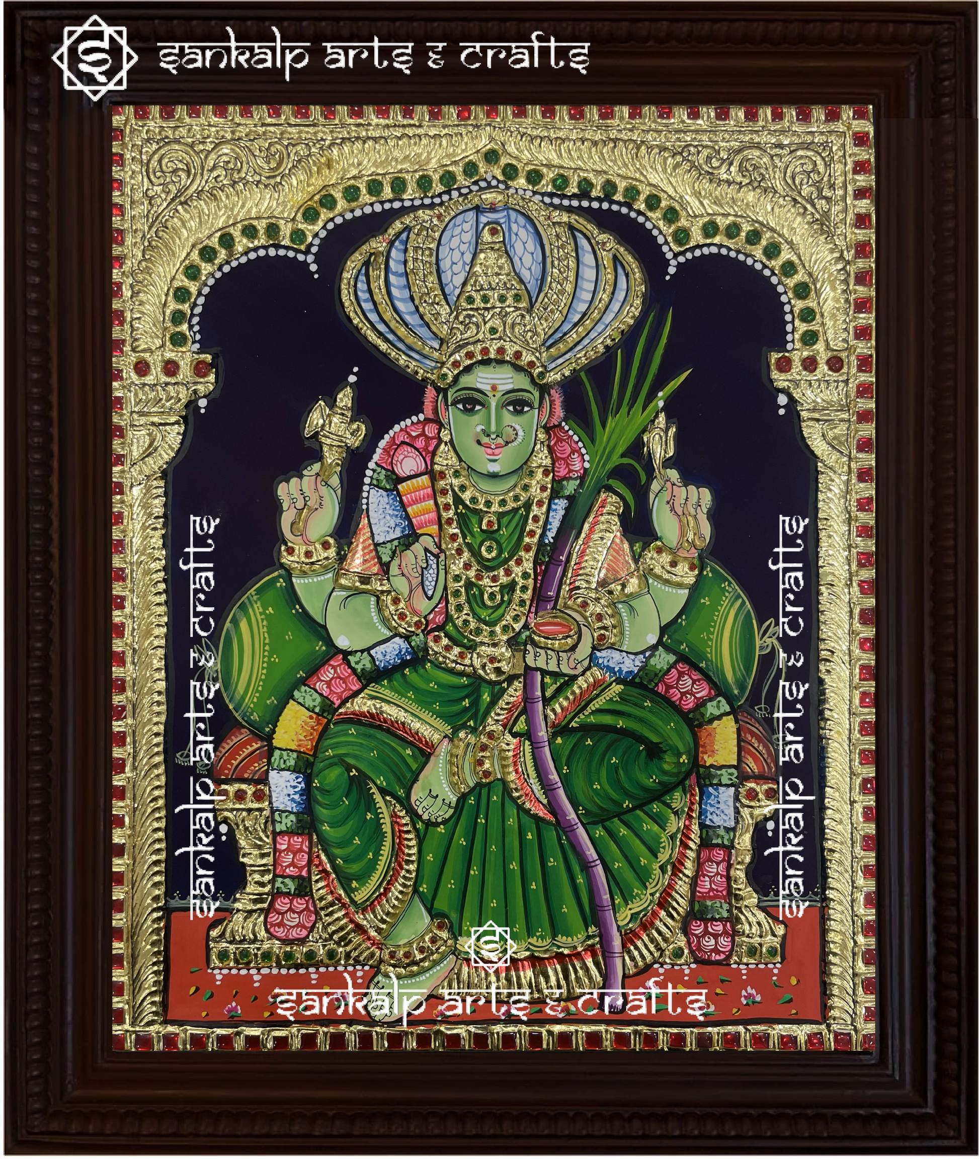 A beautifully framed Tanjore painting of Goddess Pachaiamman, showcasing intricate gold foil work and vibrant colors. A perfect decor piece for homes in Chennai & Bangalore.
