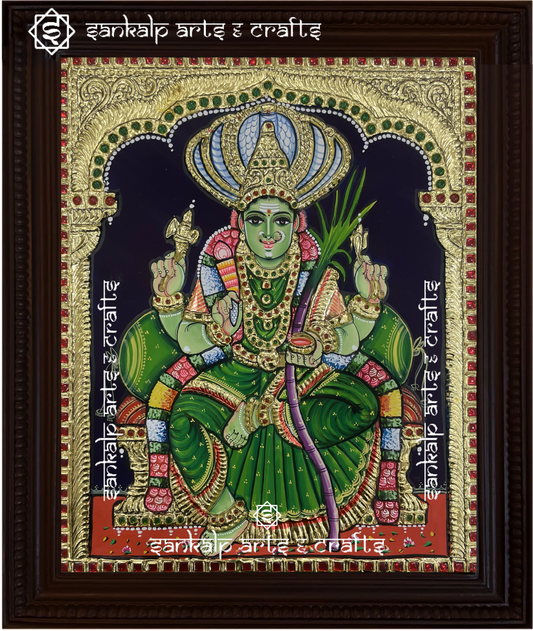 A beautifully framed Tanjore painting of Goddess Pachaiamman, showcasing intricate gold foil work and vibrant colors. A perfect decor piece for homes in Chennai & Bangalore.
