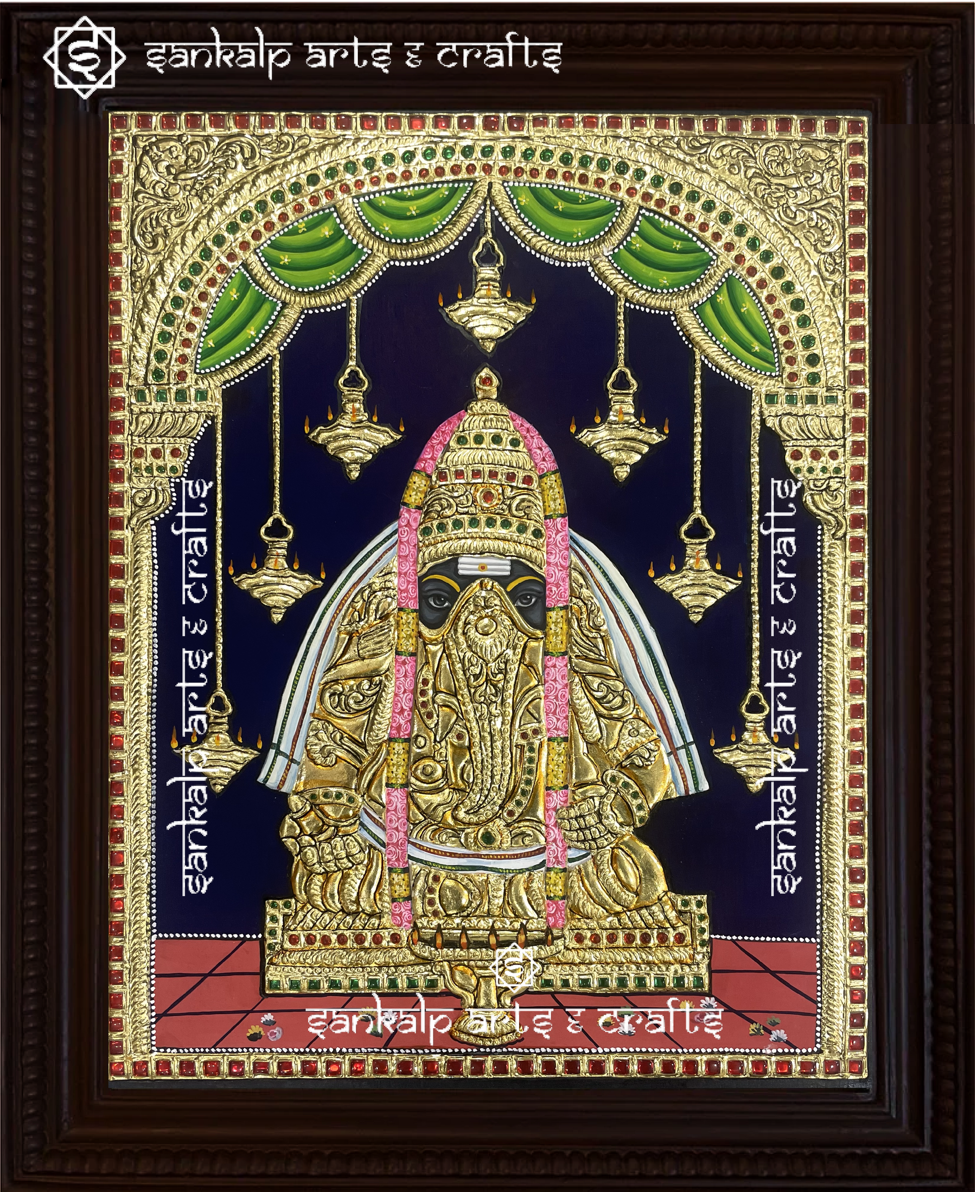 This Pillayarpatti Vinayagar Tanjore painting showcases Lord Ganesha’s powerful presence, crafted with rich colors and intricate artwork in Chennai & Bangalore.

