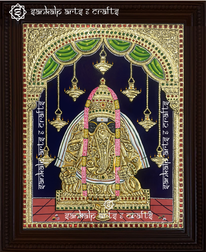 This Pillayarpatti Vinayagar Tanjore painting showcases Lord Ganesha’s powerful presence, crafted with rich colors and intricate artwork in Chennai & Bangalore.

