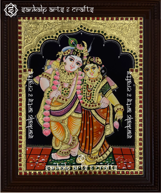 A captivating Radha Krishna Tanjore painting in South Indian style, handcrafted with rich gold foil detailing. A divine addition to homes in Chennai & Bangalore.