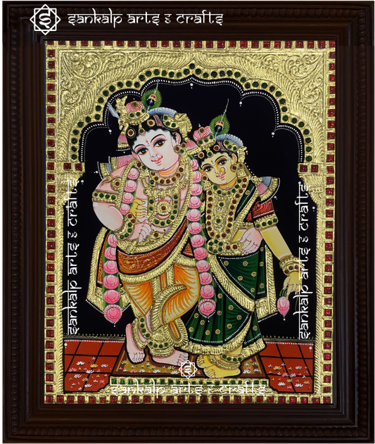 A stunning Radha Krishna Tanjore painting, handcrafted in traditional South Indian style with intricate gold foil work. A perfect devotional decor piece for Chennai & Bangalore homes.