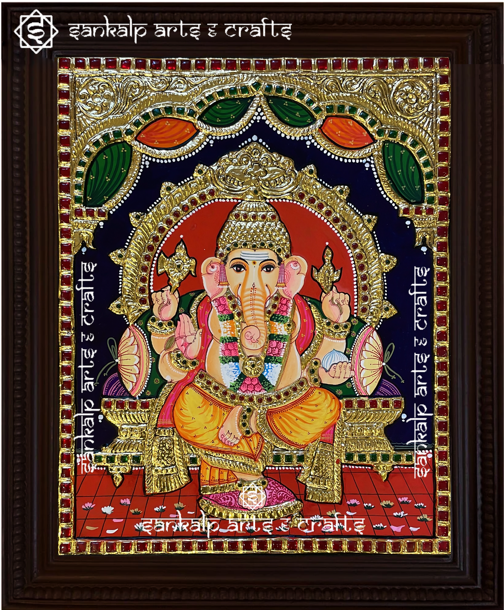 A magnificent Raja Alangara Ganesha Tanjore painting, adorned with rich gold foil detailing and vibrant colors. A perfect spiritual decor piece for homes in Chennai & Bangalore.

