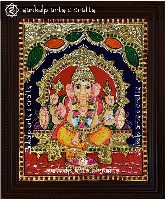 A magnificent Raja Alangara Ganesha Tanjore painting, adorned with rich gold foil detailing and vibrant colors. A perfect spiritual decor piece for homes in Chennai & Bangalore.


