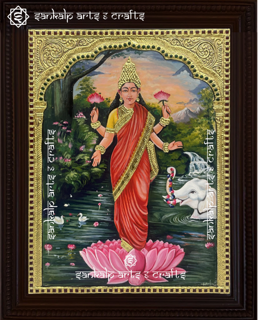 A stunning Raja Ravi Varma-style Gajalakshmi Tanjore painting, adorned with gold foil detailing and rich colors. A perfect decor piece for homes and temples in Chennai & Bangalore.

