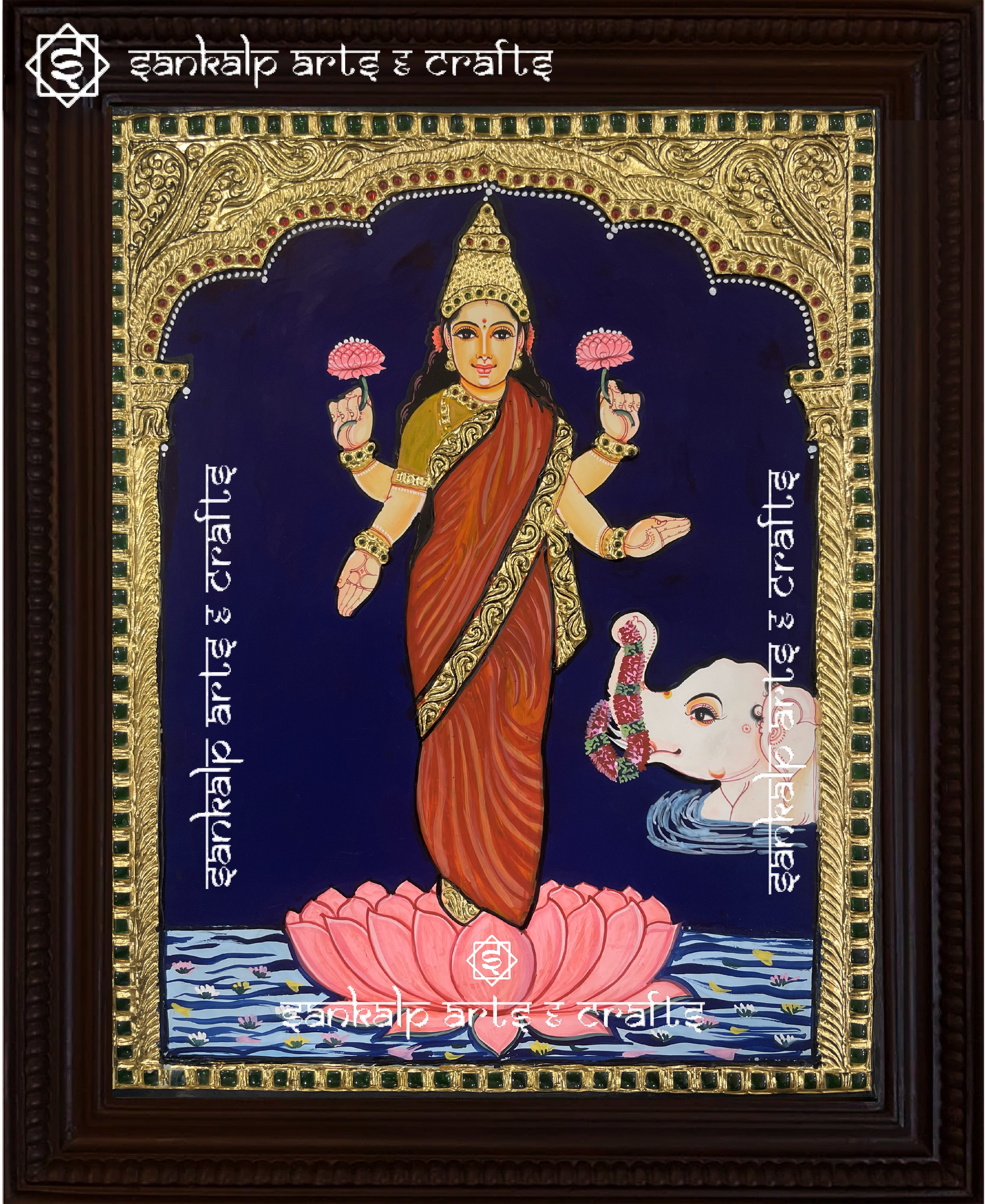 A beautifully handcrafted Raja Ravi Varma-inspired Lakshmi Tanjore painting, showcasing Goddess Lakshmi with her sacred attributes, adorned with intricate gold foil detailing and vibrant colors. This artwork represents wealth, prosperity, and divine blessings.

