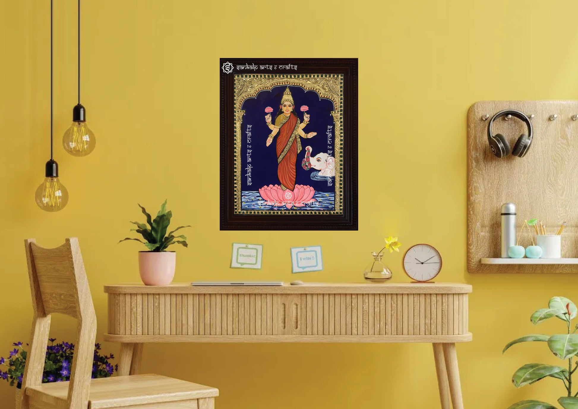 A framed Raja Ravi Varma Lakshmi Tanjore painting, intricately designed with gold foil and vibrant colors, perfect for adding a divine and prosperous touch to your pooja room or living space, inviting blessings and harmony.

