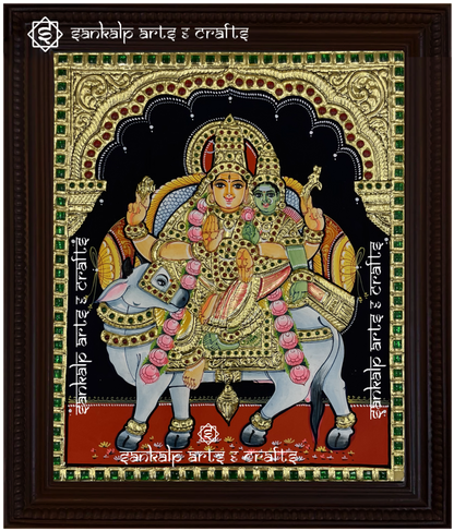 A stunning Rishaba Vahanam Shivan Parvathi Tanjore painting, featuring Lord Shiva and Goddess Parvathi on Nandi, handcrafted with gold foil detailing. Ideal for homes in Chennai & Bangalore.