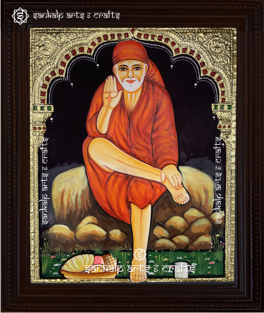 A beautifully framed Tanjore painting of Shirdi Saibaba, handcrafted with intricate gold foil work. A perfect spiritual decor piece for homes in Chennai & Bangalore.

