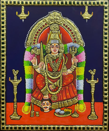 A close-up view of the Samayapuram Mari Amman Tanjore painting, showcasing the goddess’s powerful expression, rich textures, and exquisite gold embellishments.