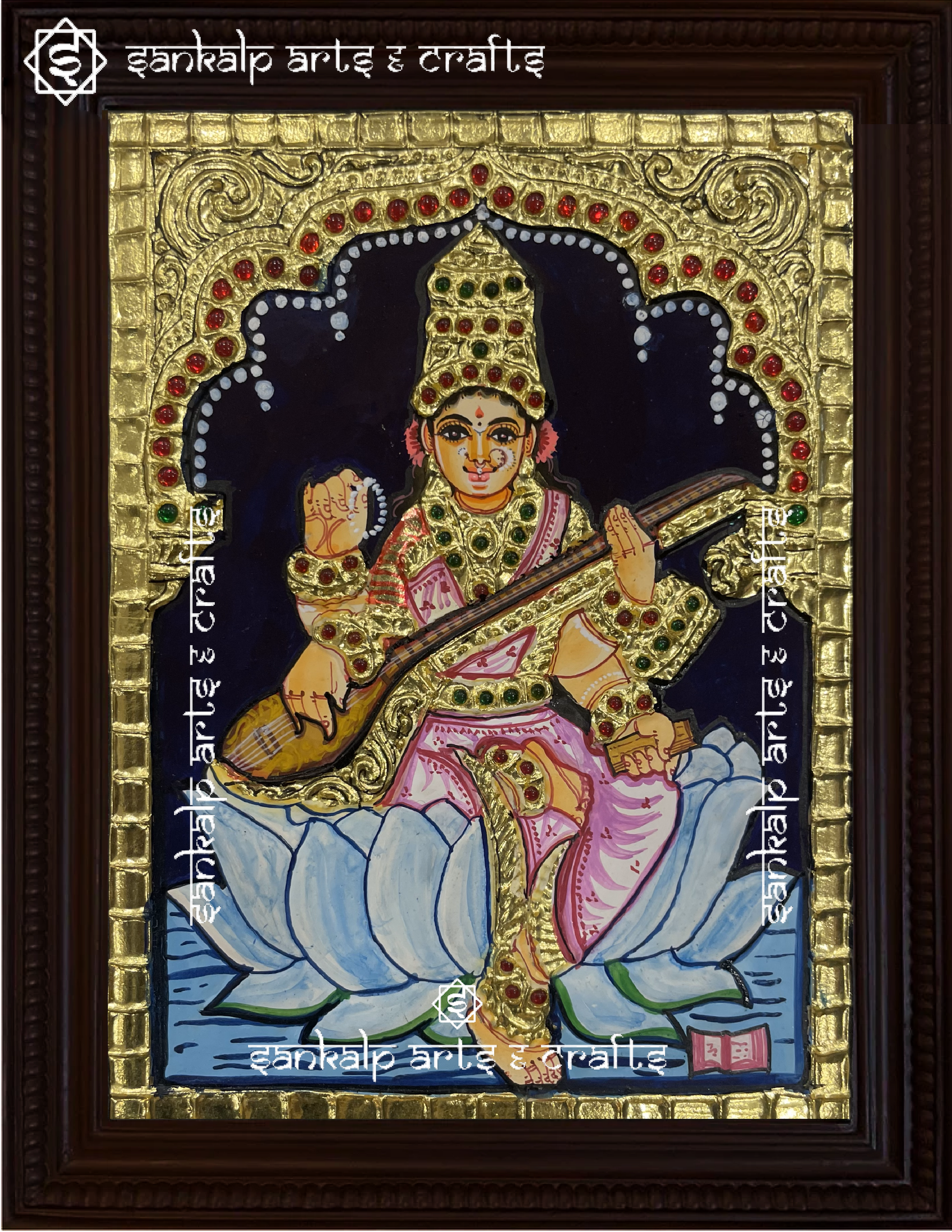 A close-up of the Saraswathi Tanjore painting showcasing Goddess Saraswathi holding her veena, with exquisite gold embellishments and rich colors, radiating divine knowledge and artistic elegance.