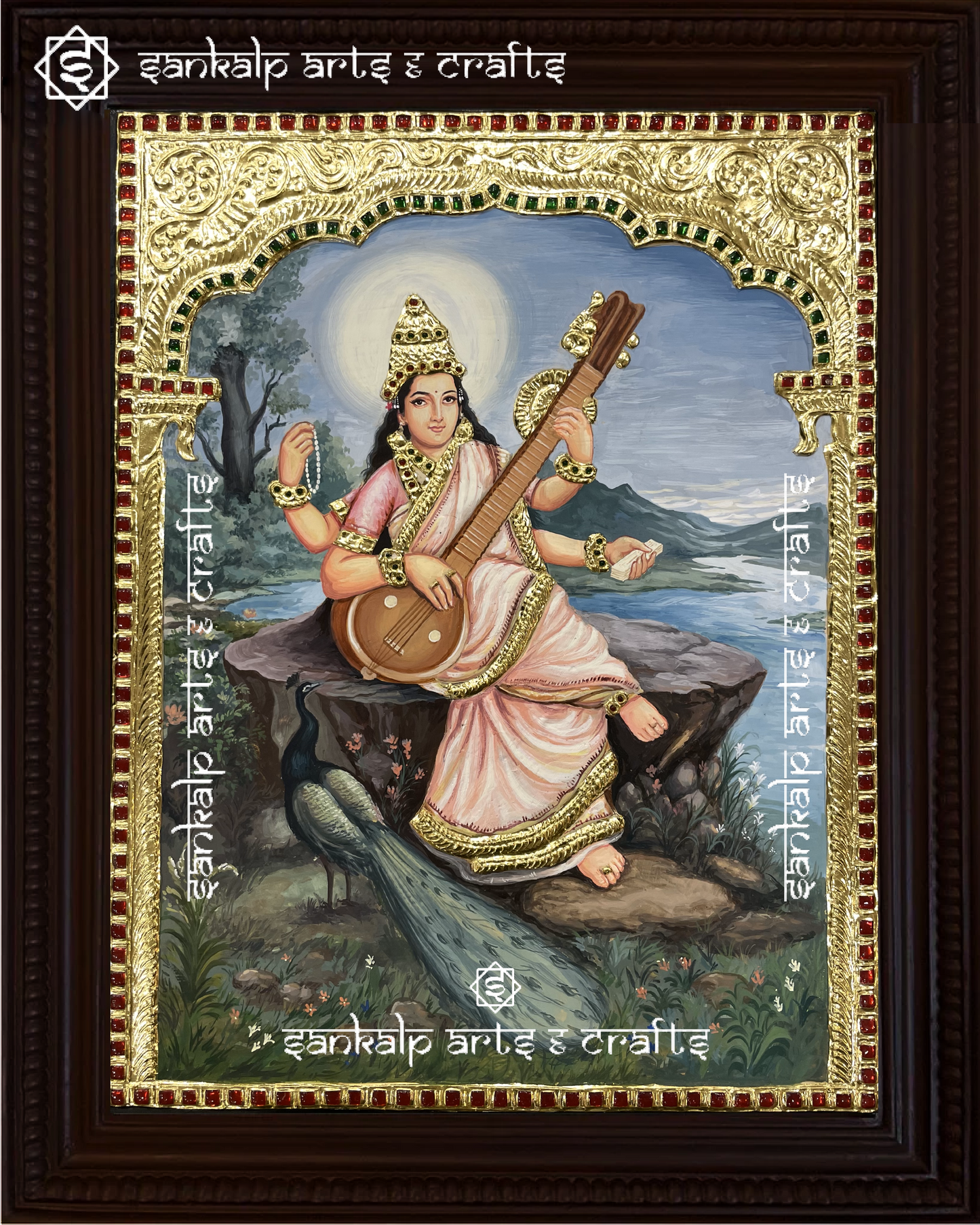 The Raja Ravi Varma Saraswathi Tanjore painting features intricate gold detailing and vibrant colors. A perfect devotional piece, loved by art collectors in Chennai & Bangalore.