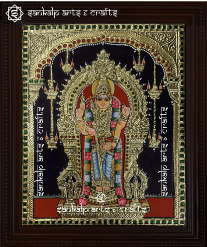 A close-up of the Thiruchendur Murugan Tanjore painting, featuring Lord Murugan holding his sacred vel, enhanced with exquisite gold work and rich hues, symbolizing spiritual power, victory, and blessings.

