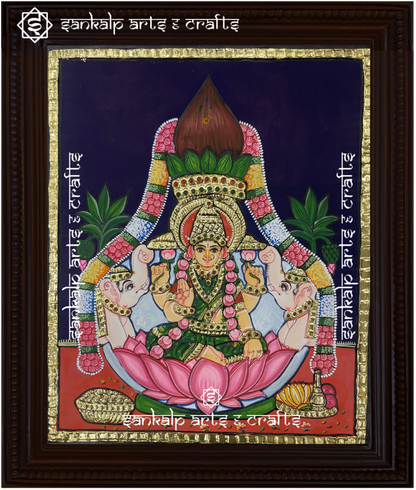 This exquisite Tanjore painting of Goddess Varamahalakshmi, symbolizing wealth and prosperity, is ideal for pooja rooms in Chennai & Bangalore.

