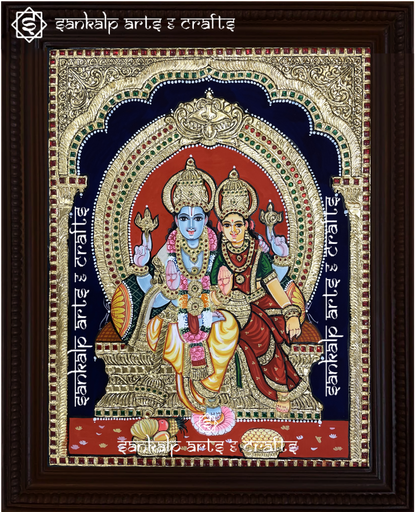 A stunning Vishnu Lakshmi Tanjore painting featuring Lord Vishnu and Goddess Lakshmi seated in divine splendor. This exquisite gold foil painting is available in Chennai & Bangalore.