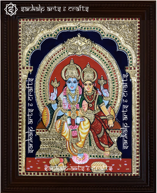 A stunning Vishnu Lakshmi Tanjore painting featuring Lord Vishnu and Goddess Lakshmi seated in divine splendor. This exquisite gold foil painting is available in Chennai & Bangalore.