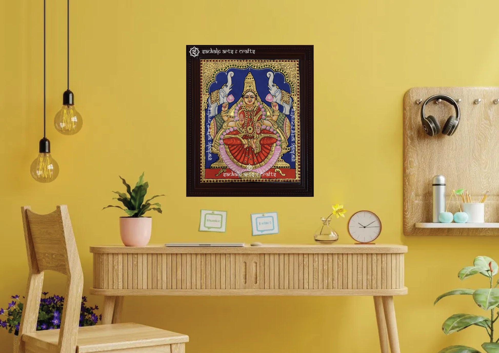 An elegantly framed Gajalakshmi Tanjore painting in antique style, ideal for traditional decor and pooja rooms, available in Chennai & Bangalore.

